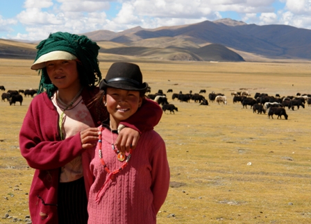 Young women herding yaks near Chamdo at 15,000 ft. elevation